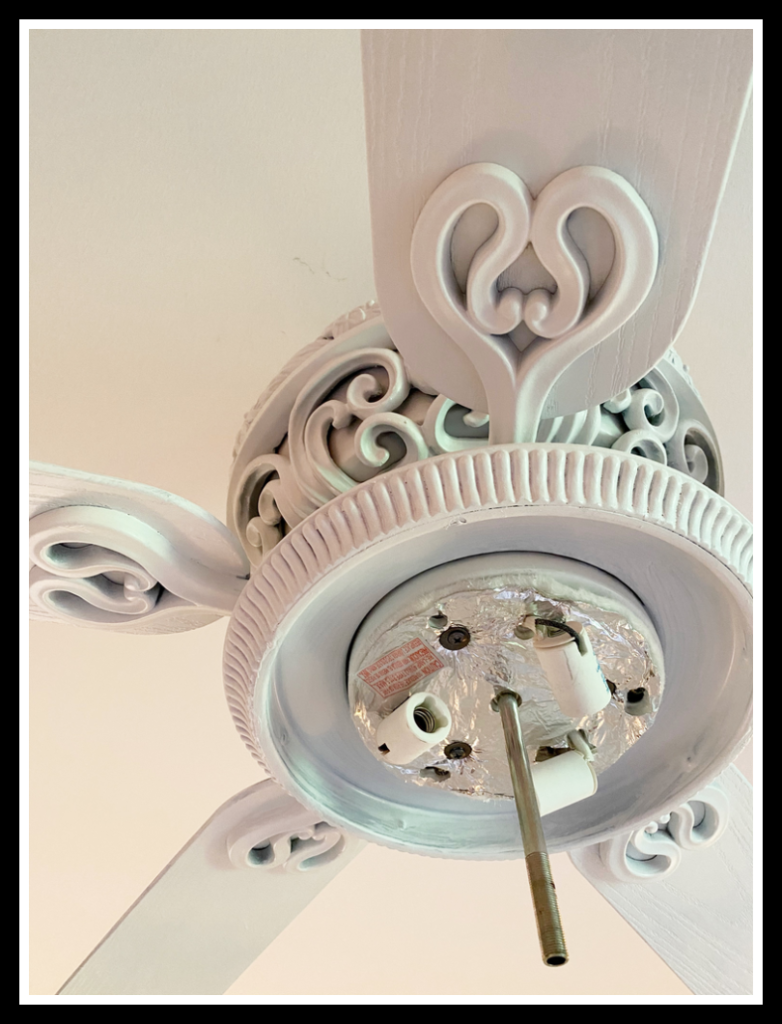 brown ceiling fan primed white