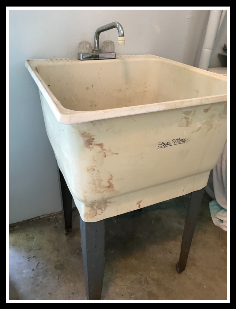 Inexpensively update an old ugly laundry sink the before