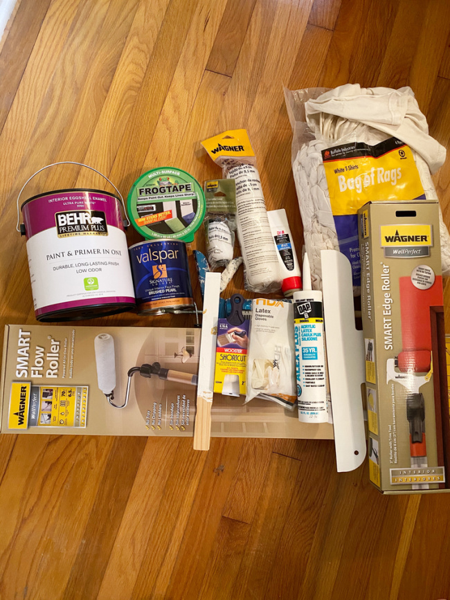 Paint, frog tape, paint rollers, caulk, paint brushes gloves and more 