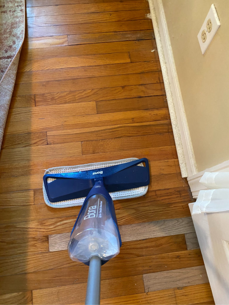 Cleaning with Hardwood floor with Bona mop getting ready for master bedroom refresh