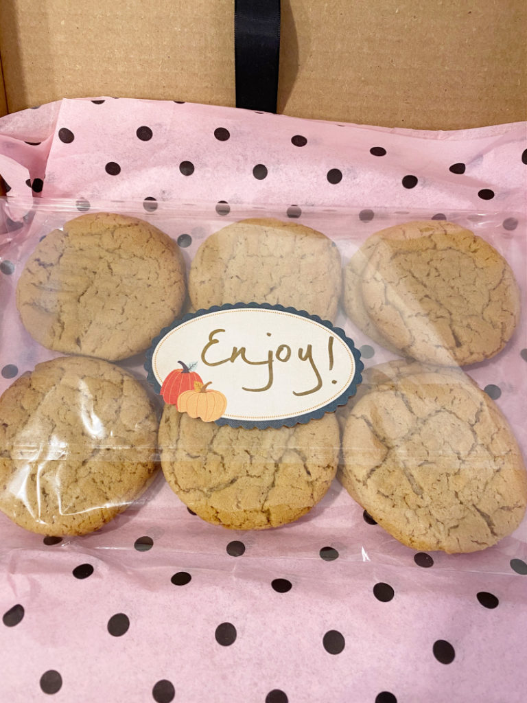 Cookies packaged ready to mail with pumpkin Sticker that reads Enjoy!