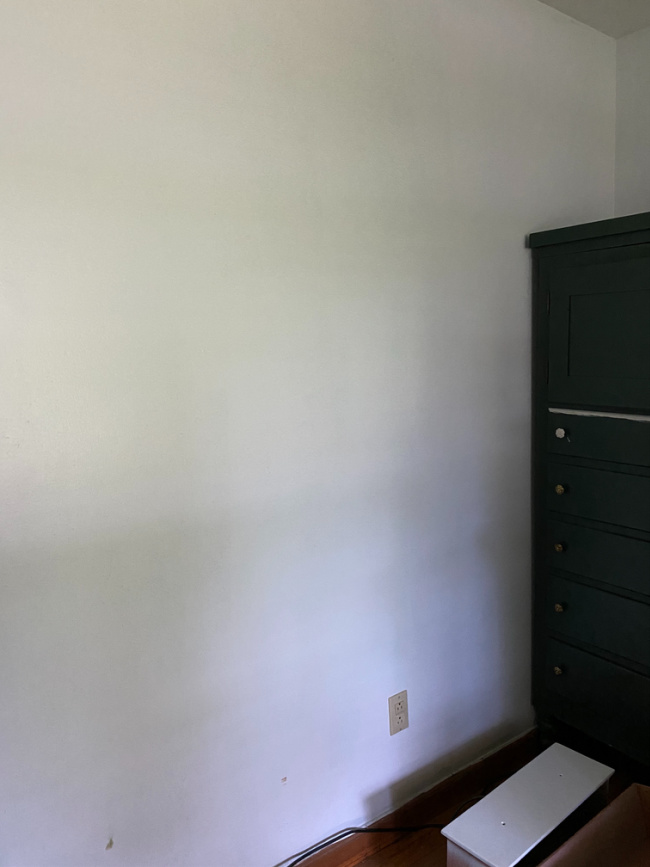 Blank wall in before guest room makeover