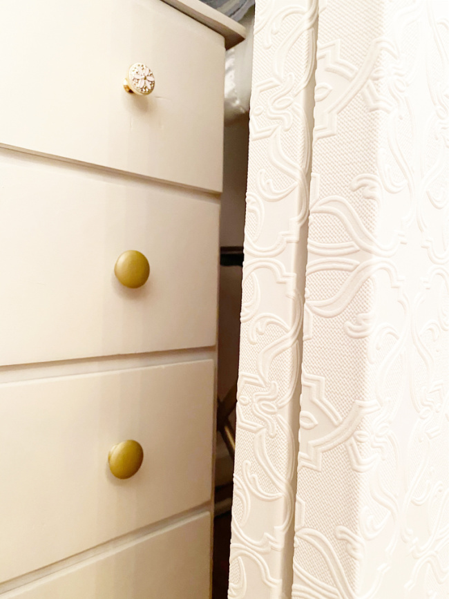 Close up of texture of wallpapered sliding closet doors