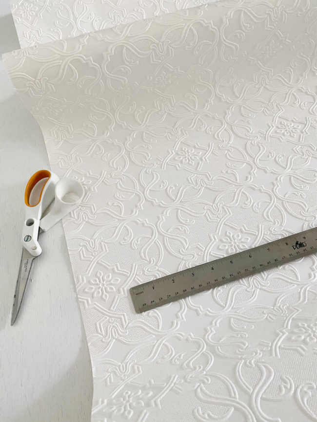 wallpaper, scissors, and ruler