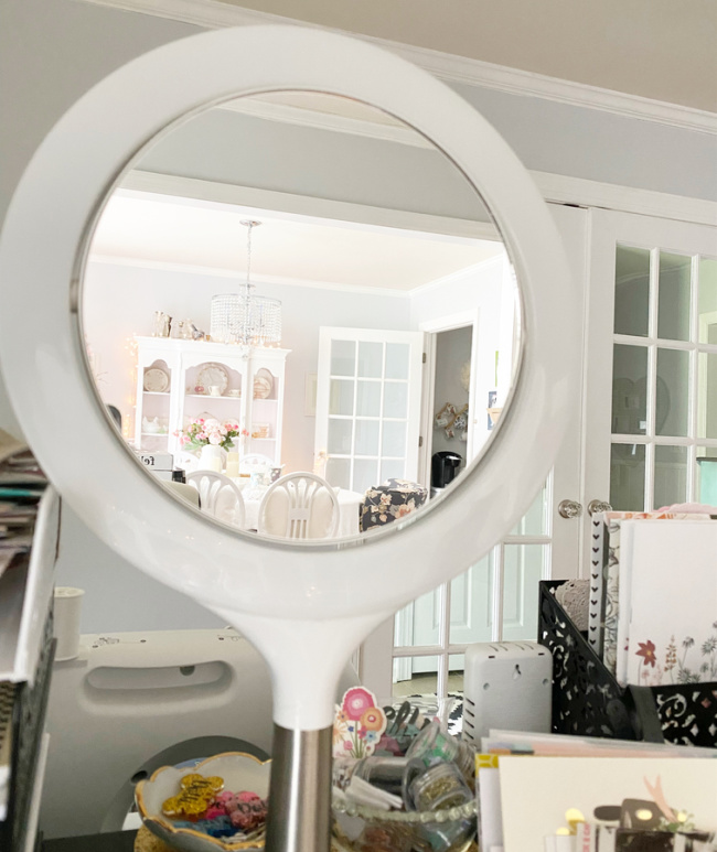 Dining room rejected in mirror on craft desk