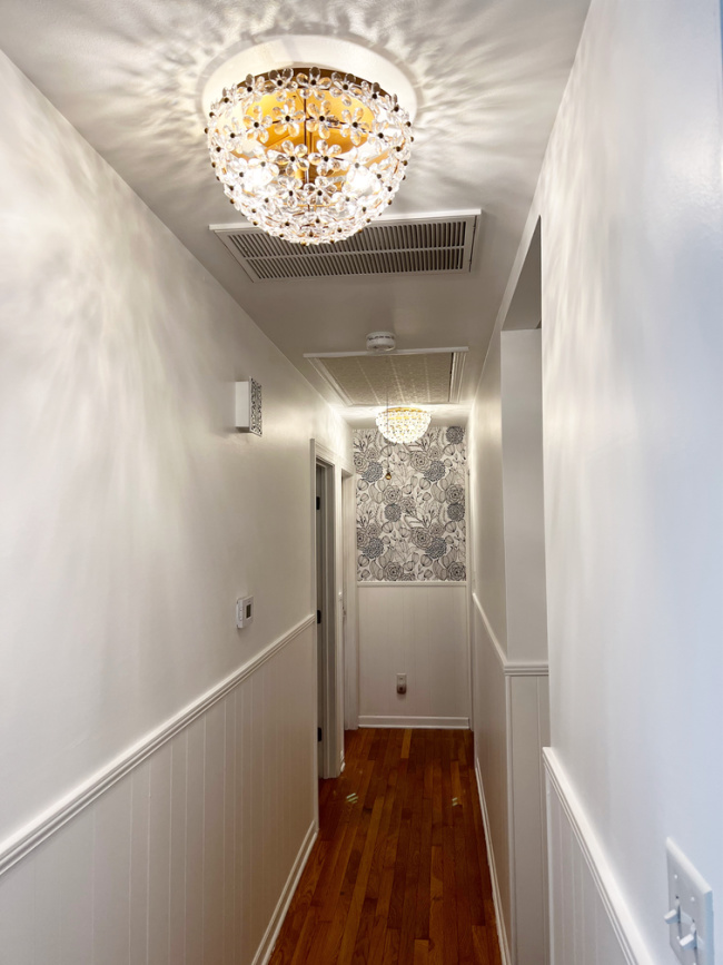 new daisy light fixture in hallway makeover with one room challenge