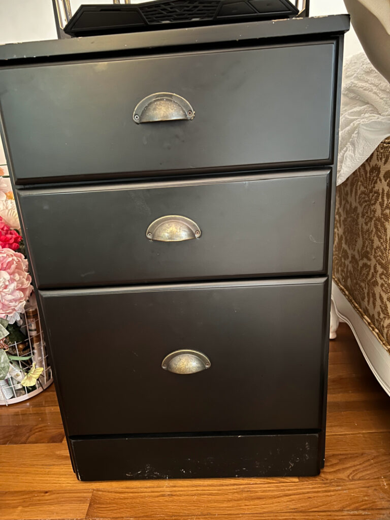 close up of black file cabinet before makeover with One Room Challenge 
