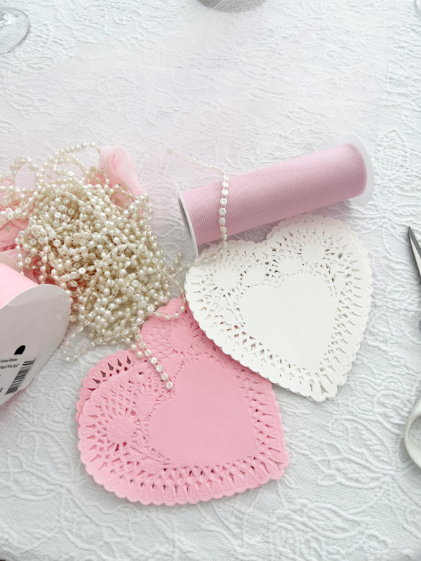 pink and white heart shaped doilies with pearl stand 