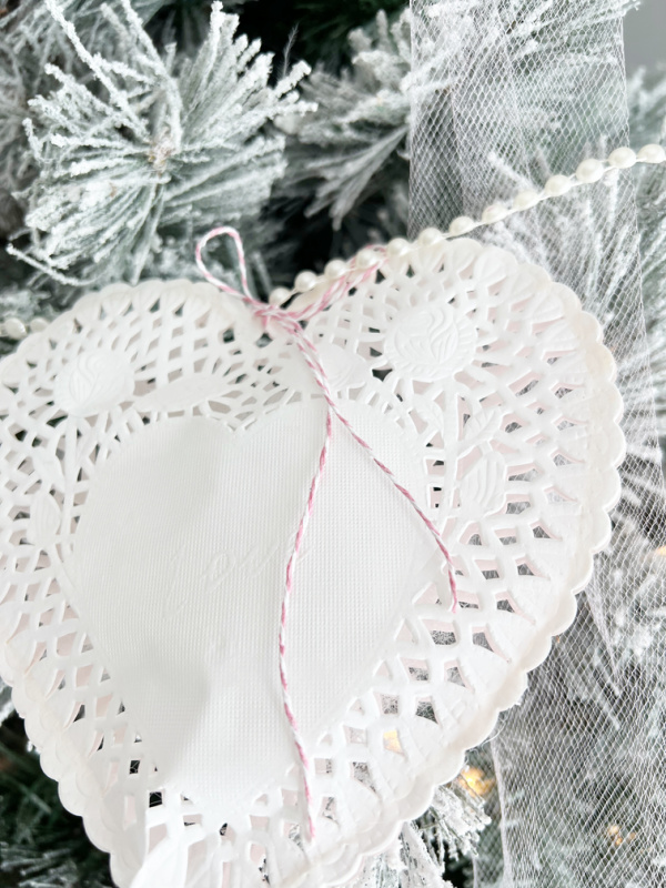 Close up of white heart shaped doilies 
