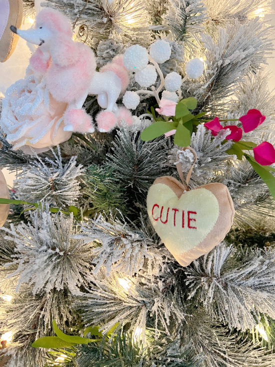 Pink and white poodle ornament on valentine tree